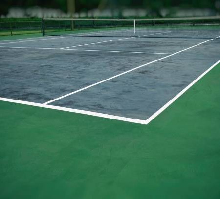 Construction d’un Court de Tennis en Béton Poreux à Limonest : Assurer Durabilité et Résistance aux Intempéries